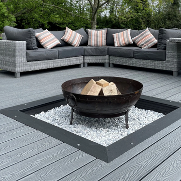 Outdoor seating area with a fire pit on a wooden deck