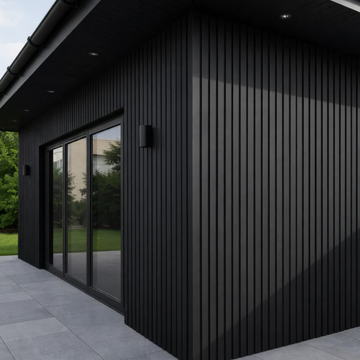 Modern black house with large glass door and windows